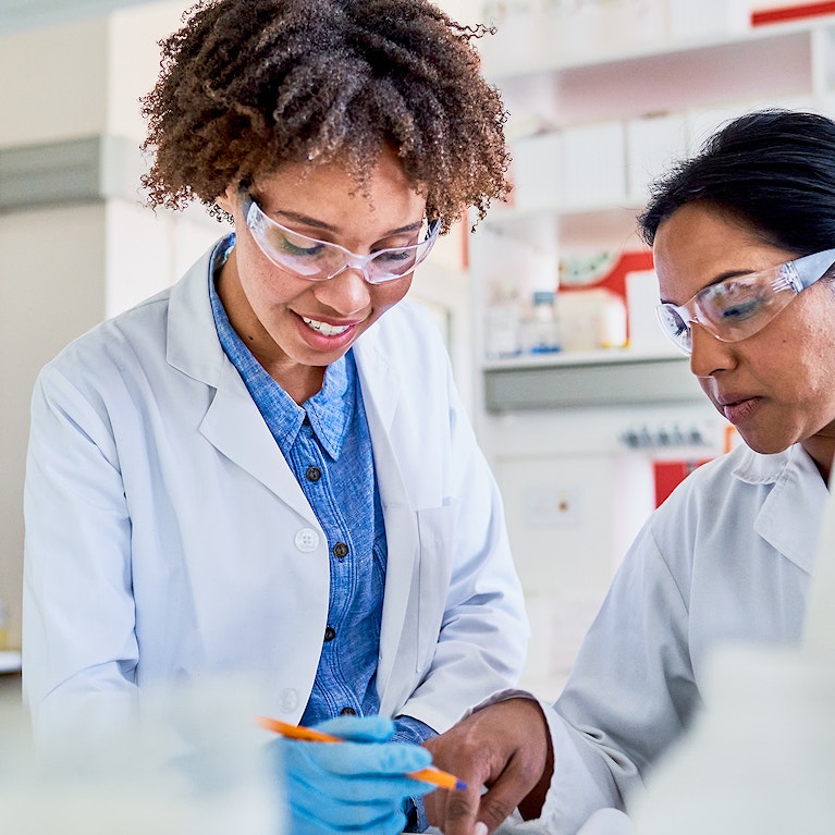 two workers in a lab