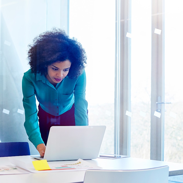 Women working at laptop.