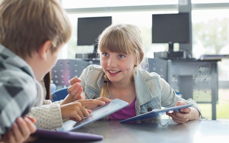 Children sat at a table