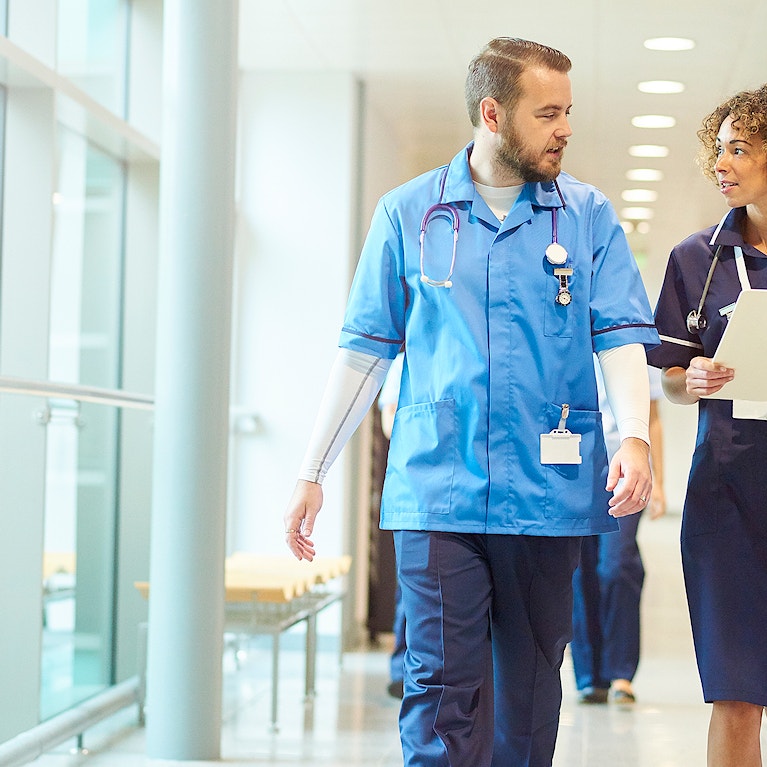 Male nurse with senior nurse