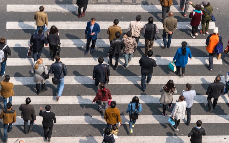 Aerial view of people on busy pedestrian crossing