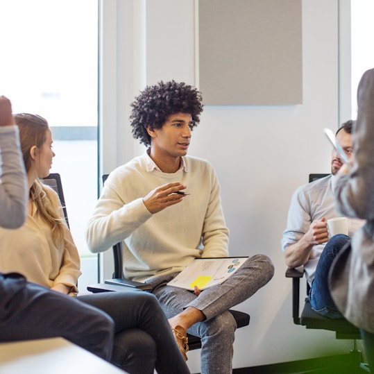 Young man leading a new business meeting