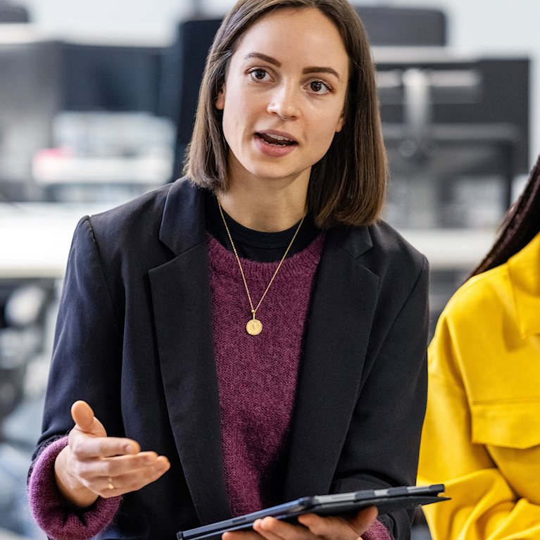 Women talking to her colleagues